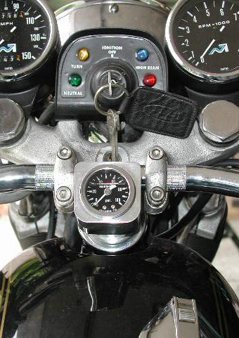 Oil gauge and mount