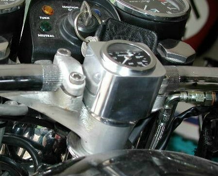 Oil gauge and mount