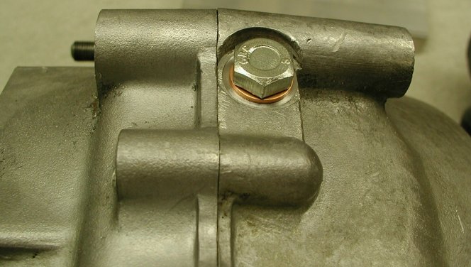 Drain plug and sealing washer threaded into our refurbished drain hole.