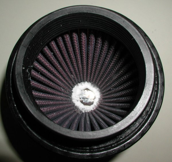 The bead of silicone inside the filter.