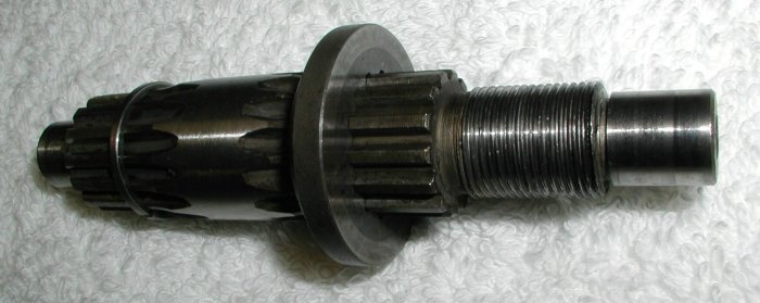 Place the thrust washer on the shaft.