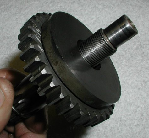 Place the gear assemble on to the shaft.