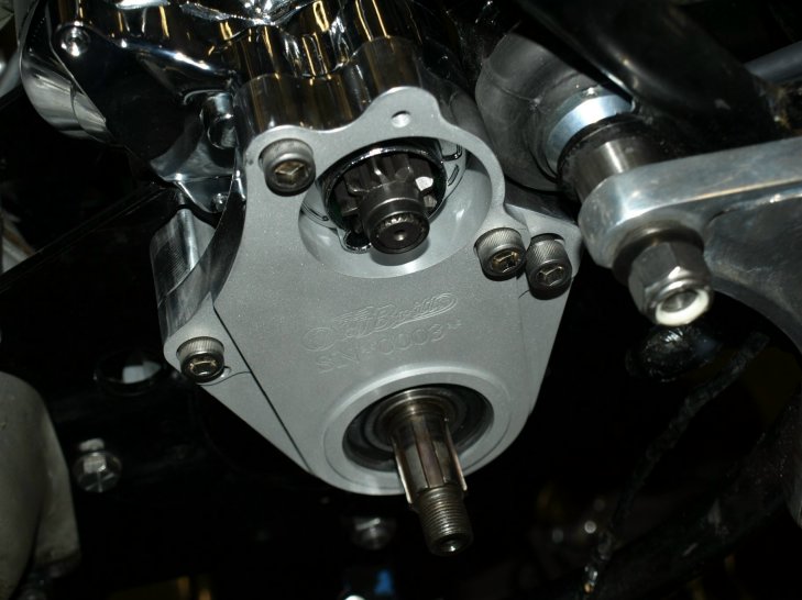 The starter bracket with the four allen bolts started.