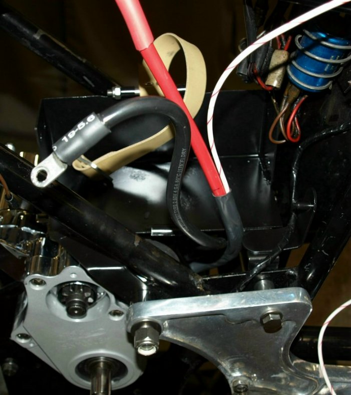 The battery box and starter wires installed.