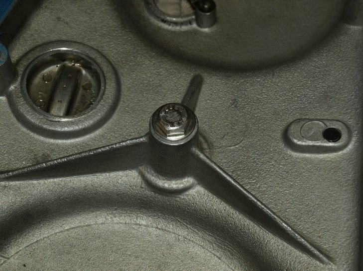 The bolt and washer inside the case.