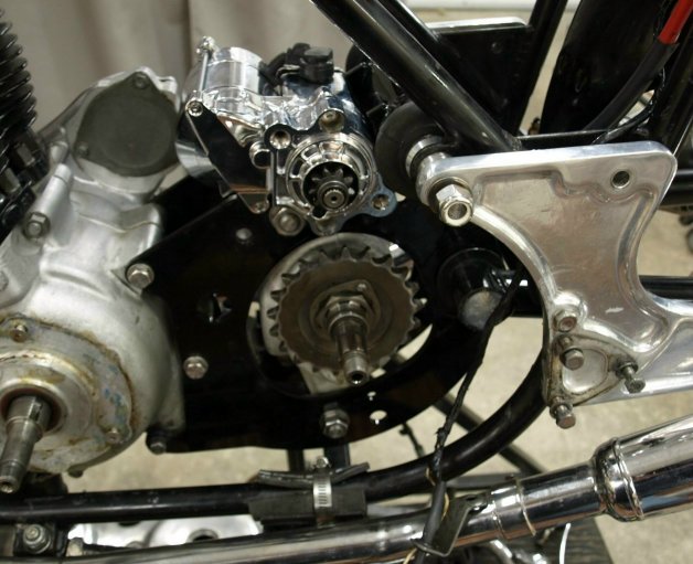 A 21 tooth sprocket installed on the gearbox.